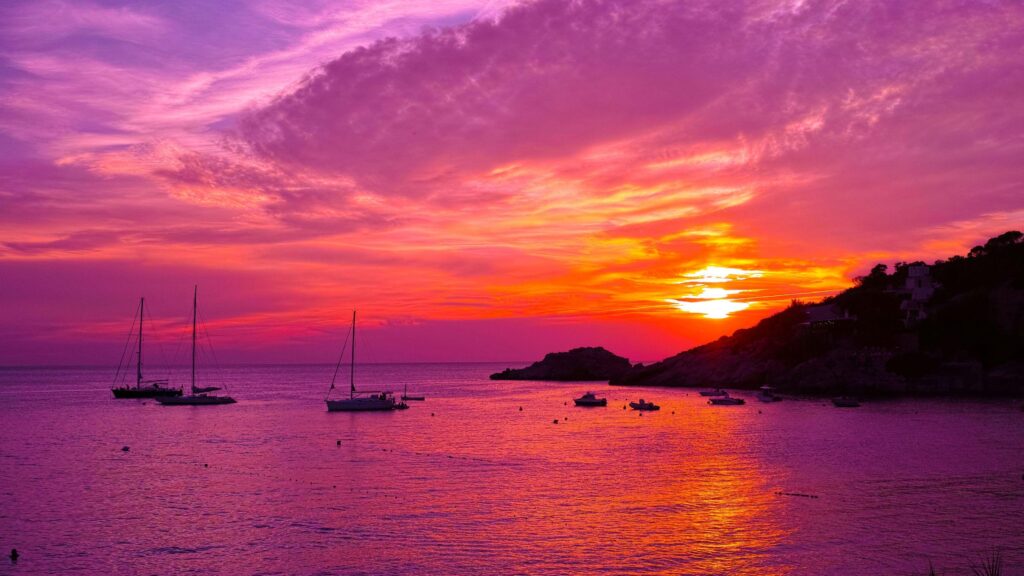 Luxury catamarans at the sunset in ibiza